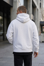 Load image into Gallery viewer, Pharrell Sports box fit men’s hoodie Snow Marle