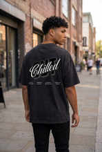 Load image into Gallery viewer, Pharrell Chilled out oversized black tshirt
