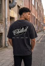 Load image into Gallery viewer, Pharrell Chilled out oversized black tshirt
